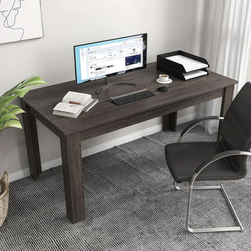 63-inch grey wood dining table with ample surface space, surrounded by a sleek chair and modern office setup.