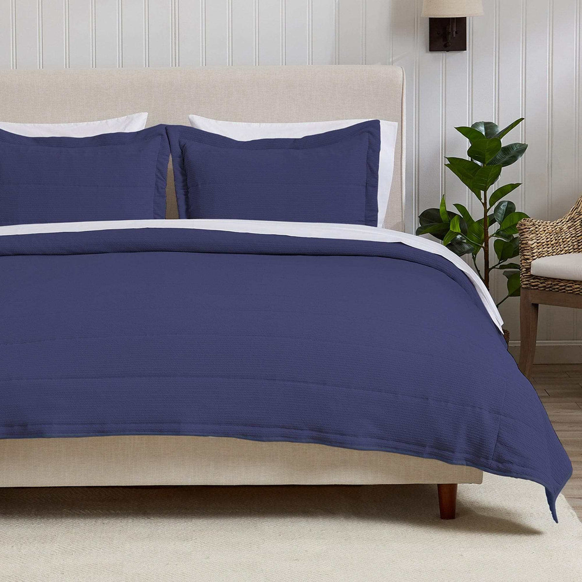 Textured striped quilt set Ellie Collection with soft microfiber and cotton-blend fill in bedroom setting