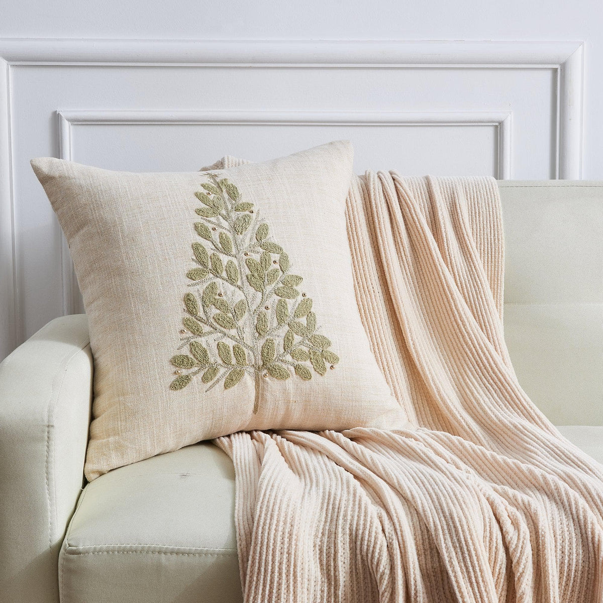 Festive holiday throw pillow with intricate embroidery and shimmering beadwork from Jubilee Collection