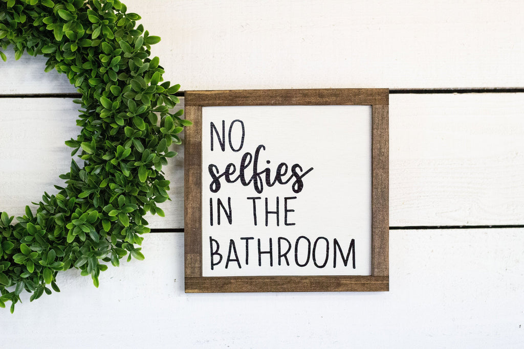 no selfies in the bathroom