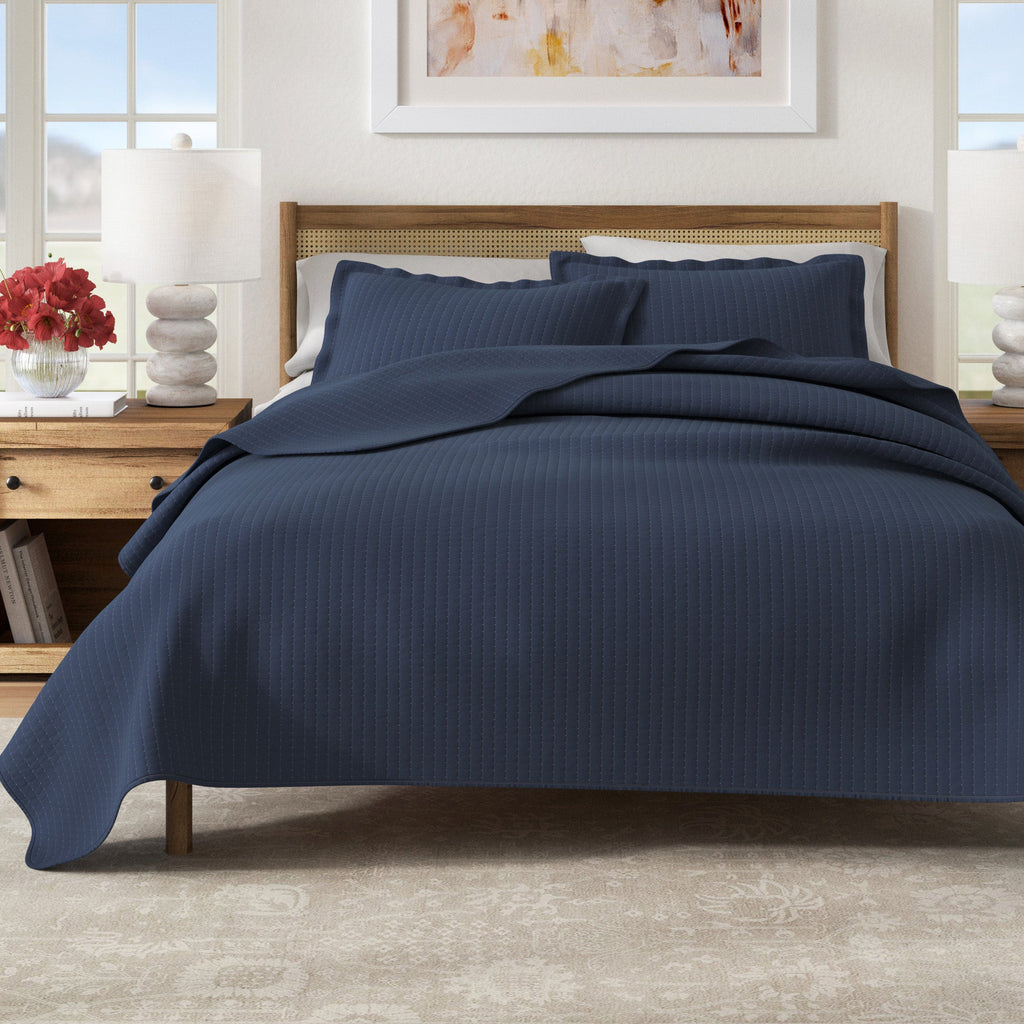 Solid quilt from the Alicia Collection by Great Bay Home, showing a cozy, textured fabric in a neutral color.