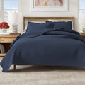 Solid quilt from the Alicia Collection by Great Bay Home, showing a cozy, textured fabric in a neutral color.