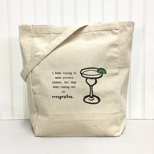 "I keep trying to make protein shakes, but they keep coming out as margaritas." Tote Bag (Textiles) product photo