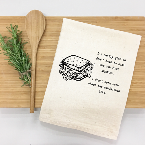 "I’m really glad we don’t have to hunt our own food anymore. I don’t even know where the sandwiches live." Kitchen Towel (Textiles) product photo